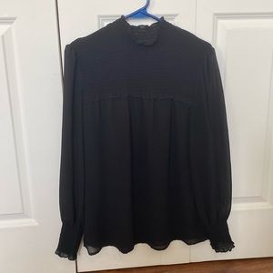 Highneck sheer black blouse